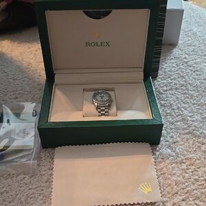 Rolx Silver Stainless Steel Watch with Light Blue Dial